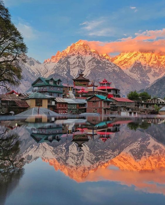 Buddist monestry near river showing reflection on water