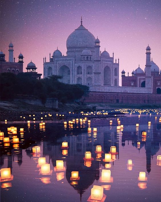 beautiful taj mahal in dim evening lights giving pinkish effect